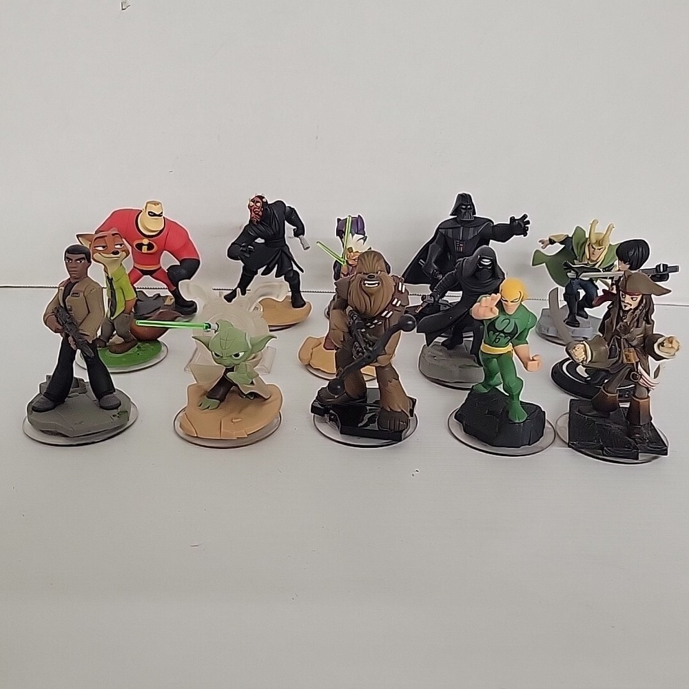 Disney Infinity Lot of 15 Figures Darth Vader Yoda Chewbacca Jack Sparrow Marvel